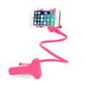 Black flexible long arm phone stand with V-clip holder extended on a desk