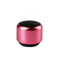 Small portable Bluetooth speaker in black, blue, gold, or pink colour, showing compact design.