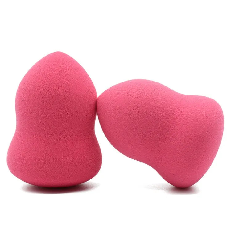 Pink non-latex makeup foundation sponge on a white background showing its 4x4x5.6cm size.