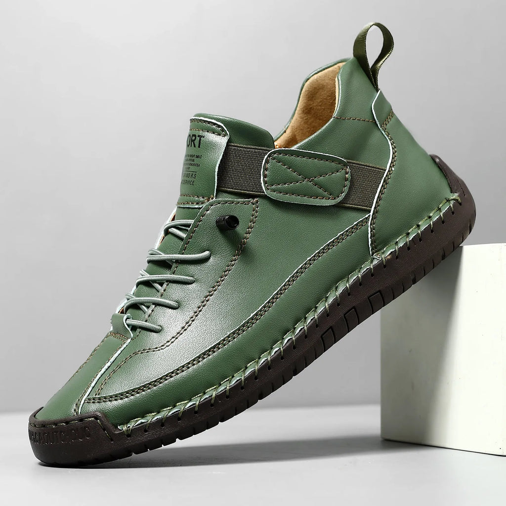 Men's mid-top Martin boots with microfiber upper, leather lining, and rubber sole in solid colour options for winter outdoor wear.
