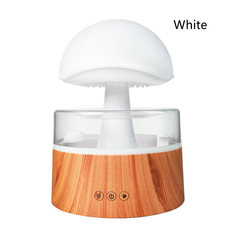 White rain cloud shaped humidifier with falling water droplets and multi-colour lighting