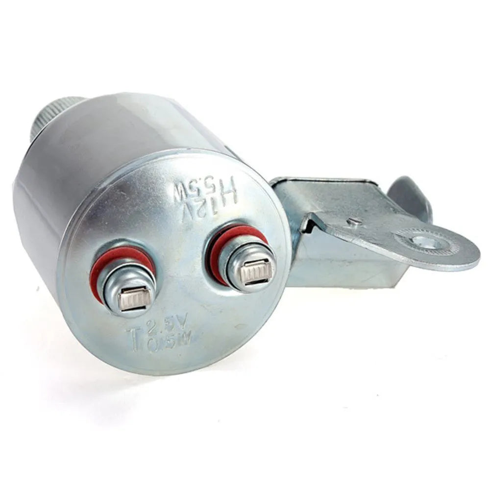 Silver bicycle dynamo generator light kit mounted on a bike fork, with wires for headlight and tail light connections.
