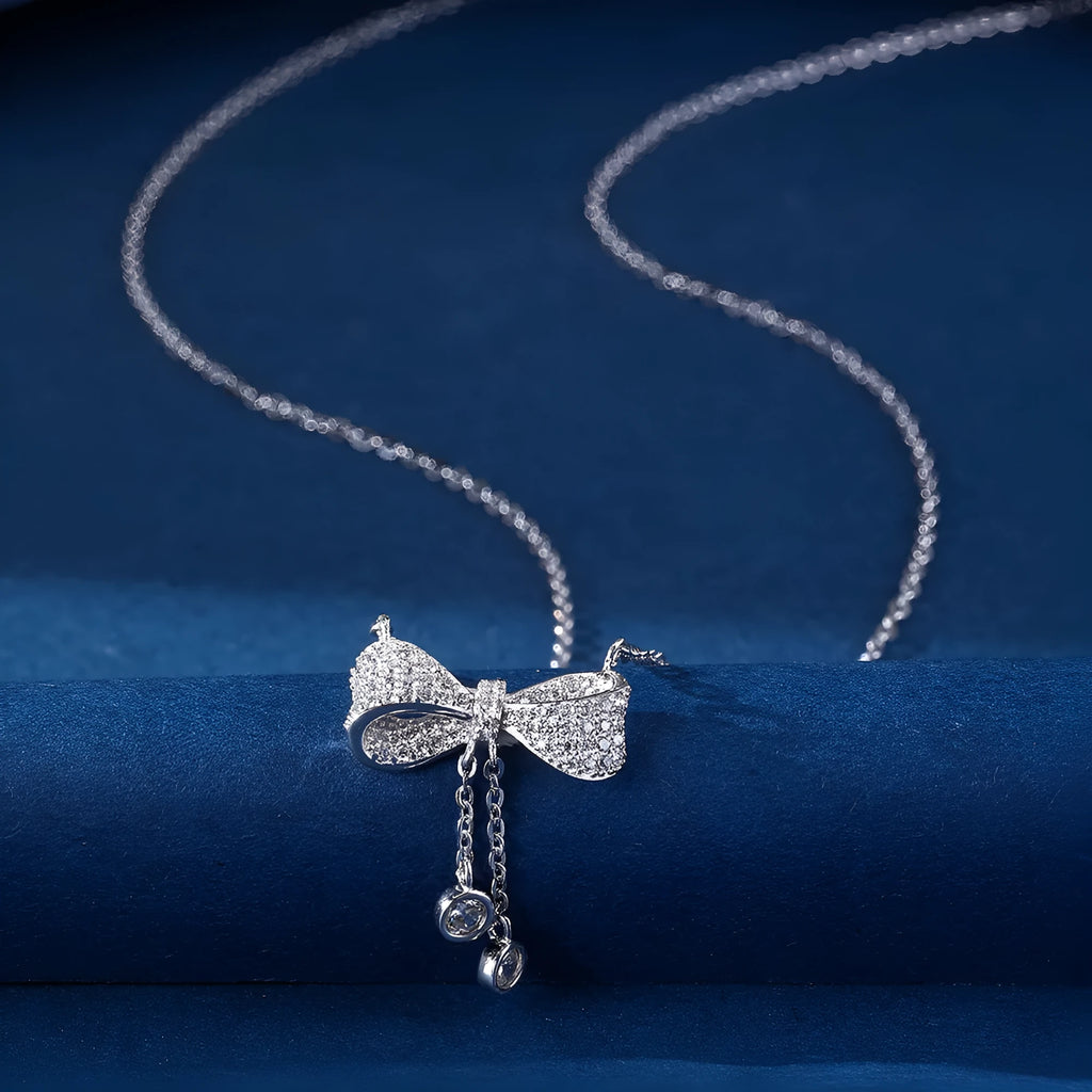 S925 sterling silver bow pendant necklace on O-ring chain with adjustable 40-45cm length