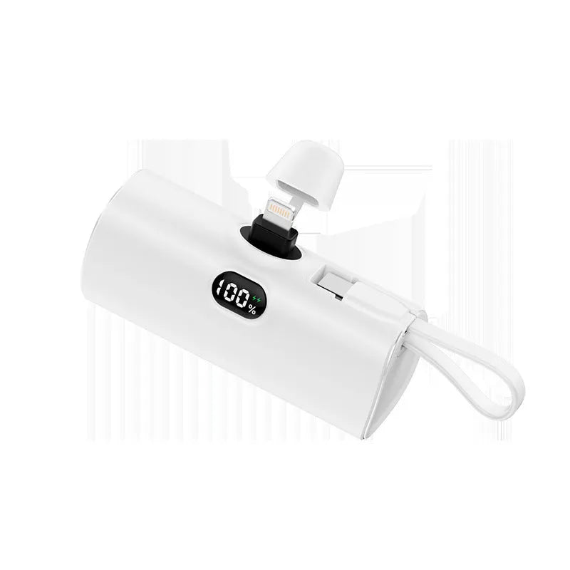 Wireless pocket power bank with digital display showing battery percentage in compact black casing