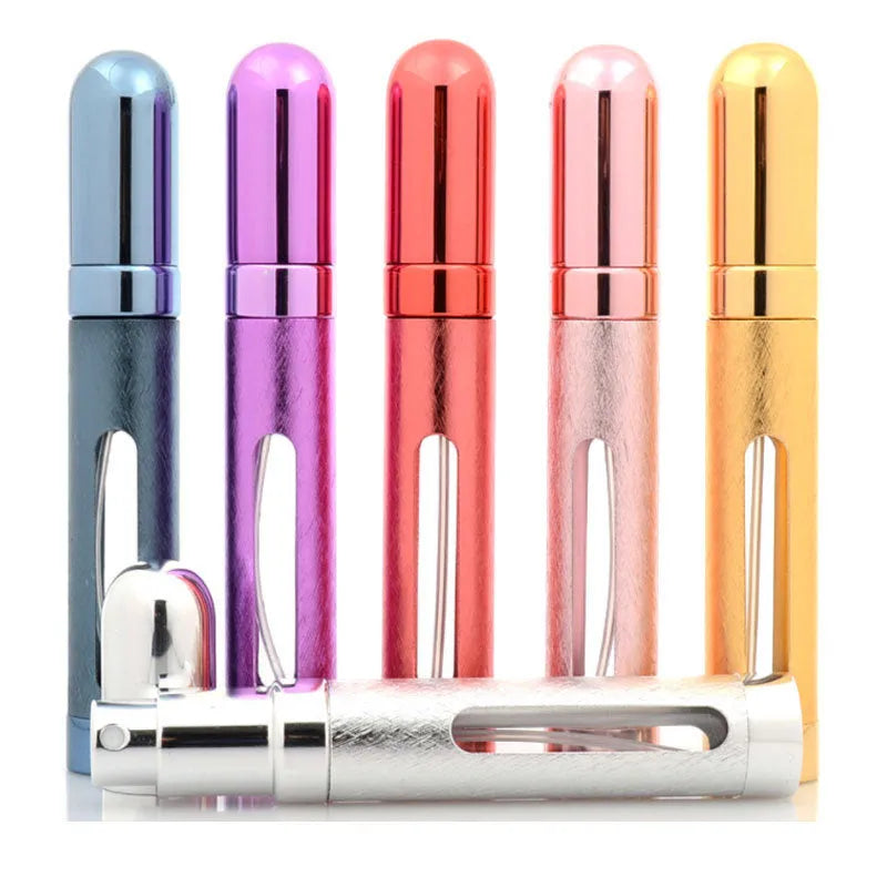 Slender aluminium travel perfume bottle with glass liner in a choice of six colours, shown next to a ruler showing 115mm length.