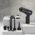 Black wireless handheld car vacuum cleaner with multiple brush and nozzle attachments