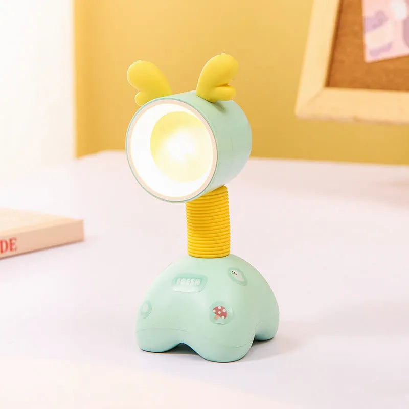DIY magnetic cartoon small night lamp with multi-angle adjustable lighting on desktop