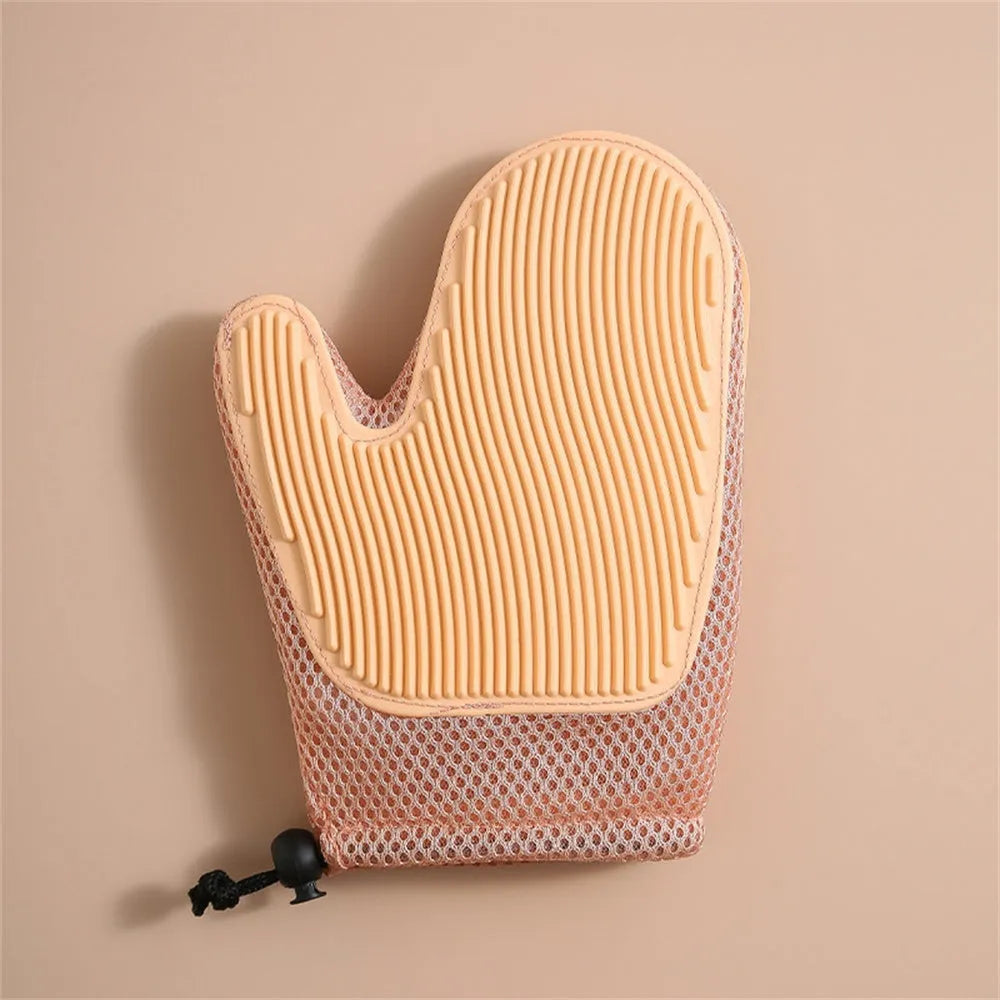 Dark blue pet grooming glove with silicone nubs for removing cat and dog hair.