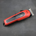 Professional digital electric hair clipper in black, red or white with brushless motor and multiple limiting combs