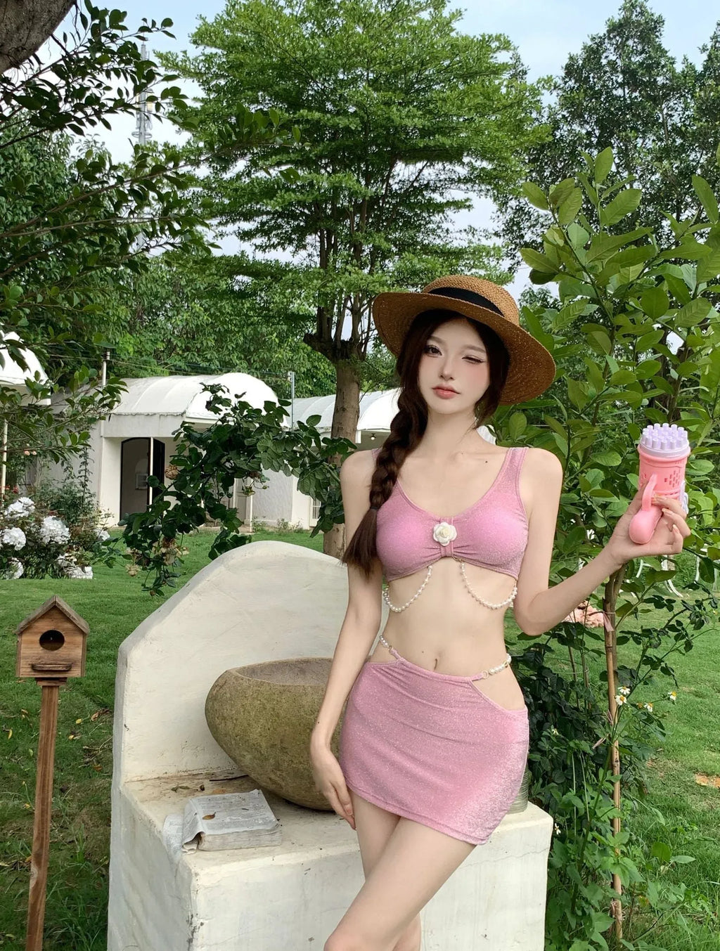 Polyester three-piece bikini swimsuit set in black or pink colours with briefs style design