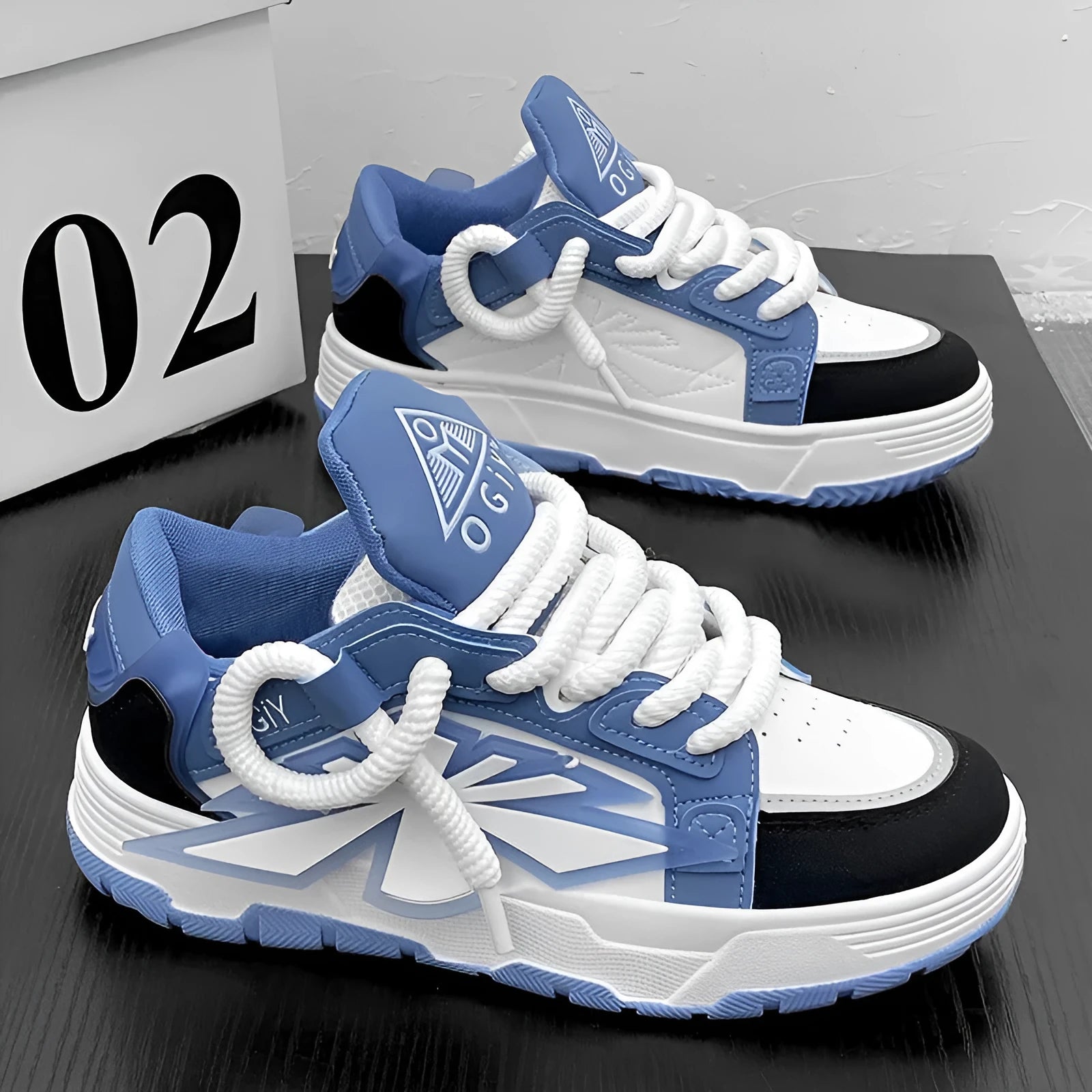 Men's white chunky sneakers with thick rubber sole and cartoon pattern details