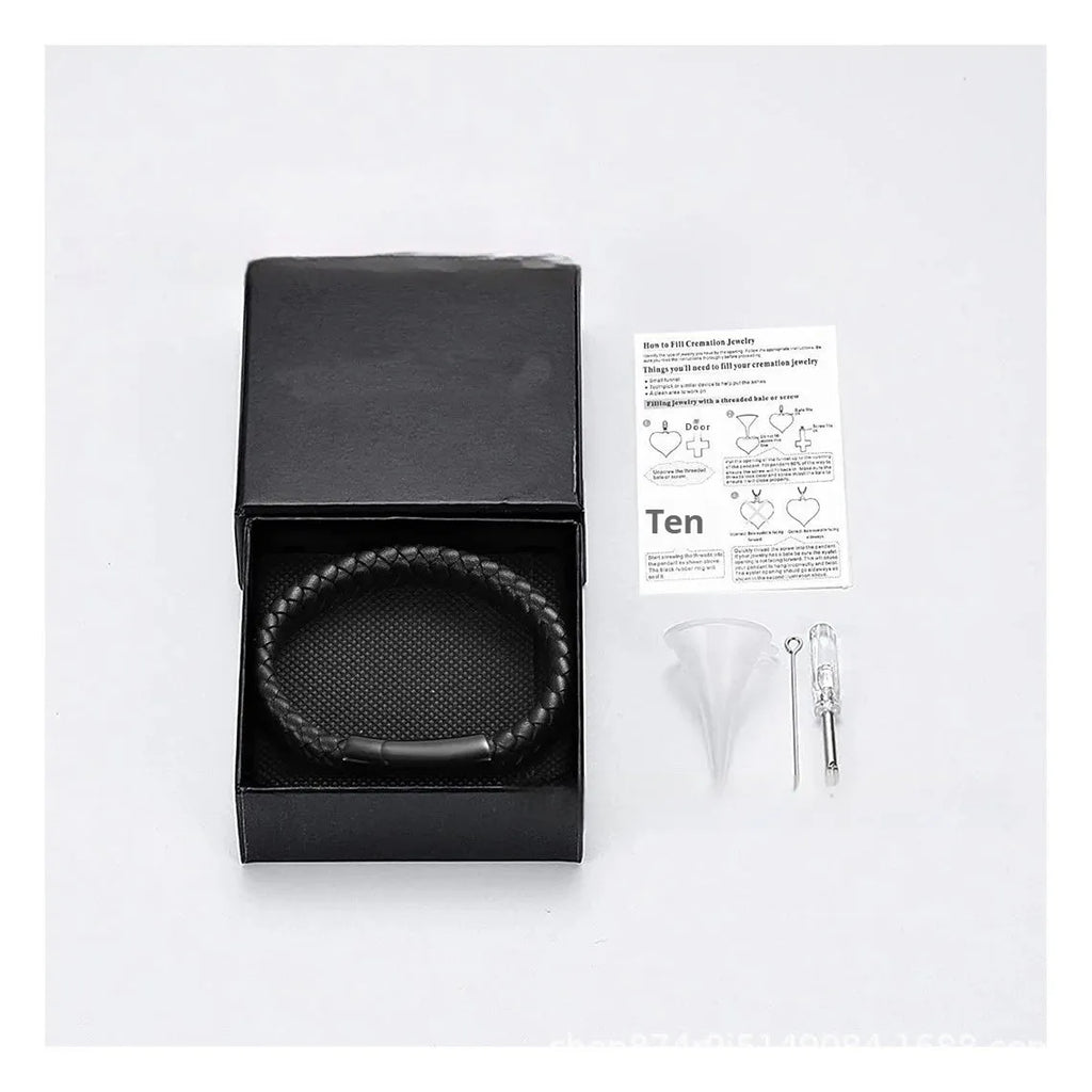 Black stainless steel and leather woven casket bracelet with English text, in a gift box.