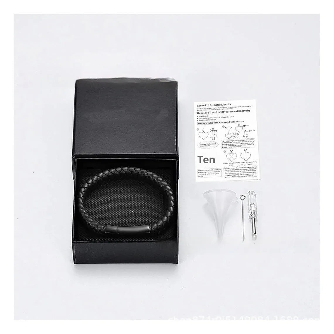 Black stainless steel and leather woven casket bracelet with English text, in a gift box.