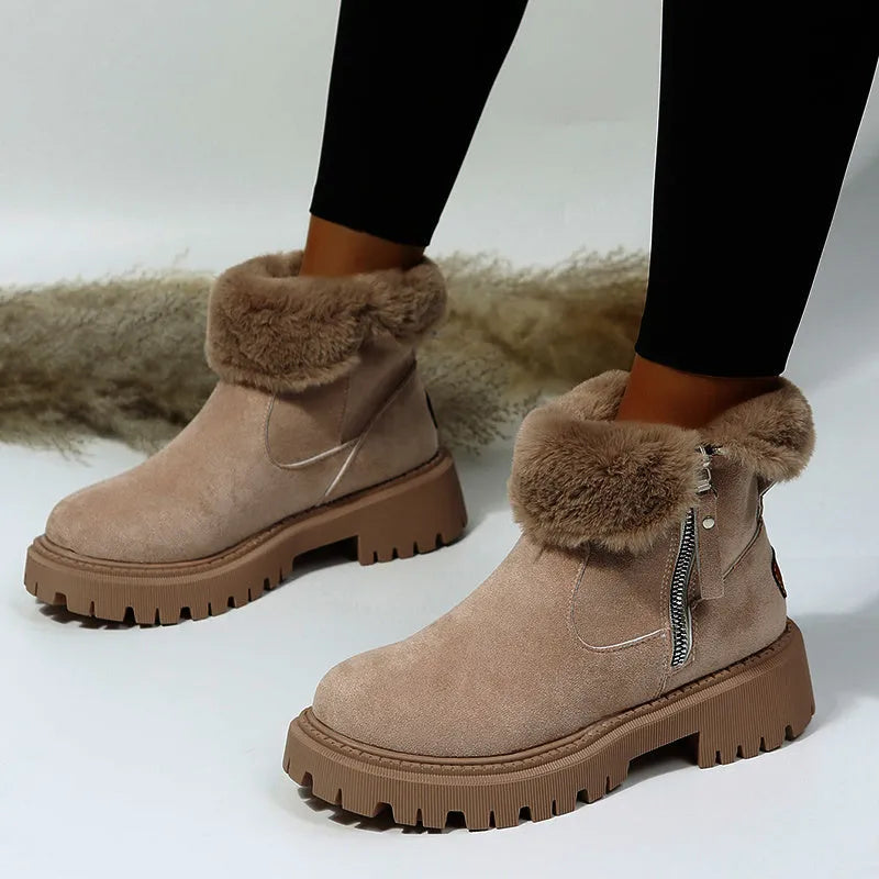 Women's black high-top snow boots with side zipper and round toe, made from cow suede.