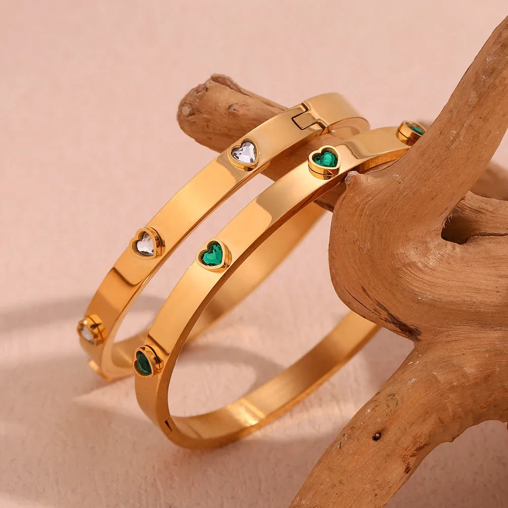 Golden stainless steel bracelet with micro-inlaid peach heart pendant and zircon or diamond accents