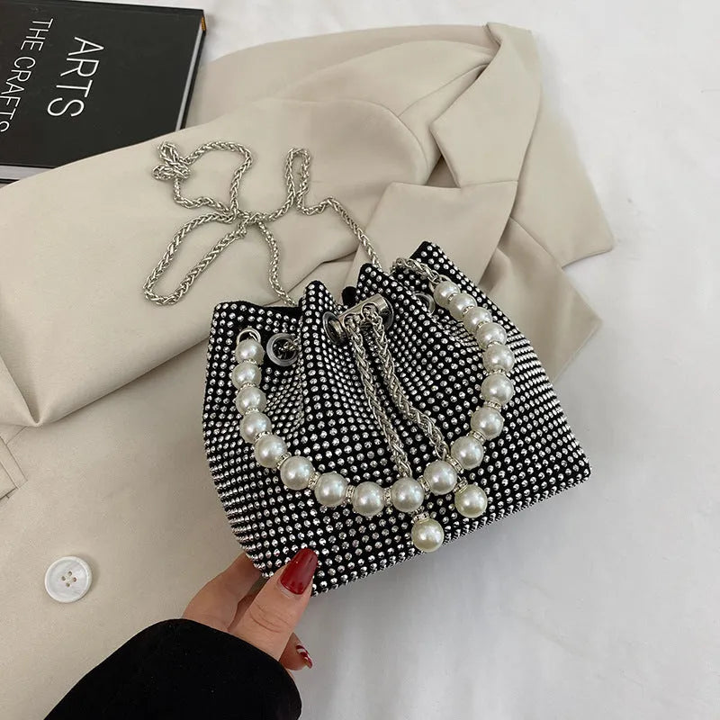 Diamond detailed PU leather crossbody bag with chain strap in bucket shape design