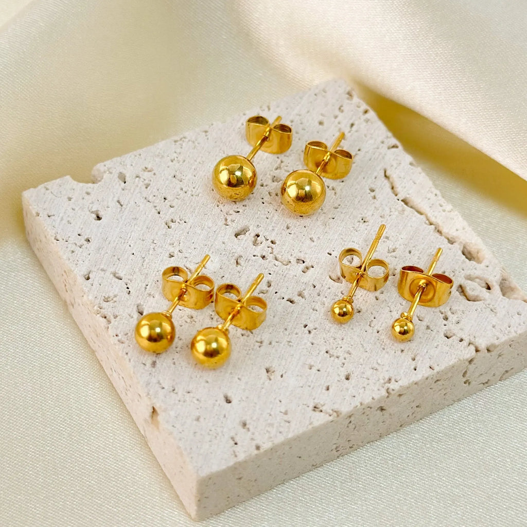 Stainless steel 18K gold-plated ball stud earrings in geometric round design