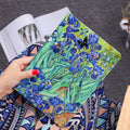 Handmade liquid silicone iPad flip case showing apricot flower artistic design on cover.