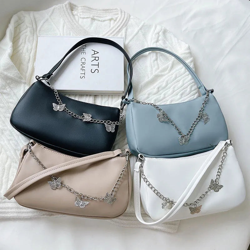 Women's retro style butterfly chain underarm bag in synthetic leather with crossbody strap