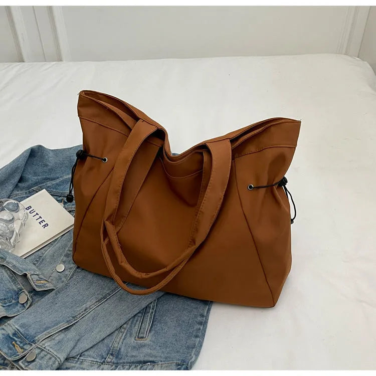 Soft Oxford cloth folding tote bag in street trend style shown in multiple colour options