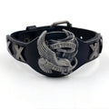 Black geometric leather bracelet with metallic eagle clasp showing 26cm length and varying width dimensions