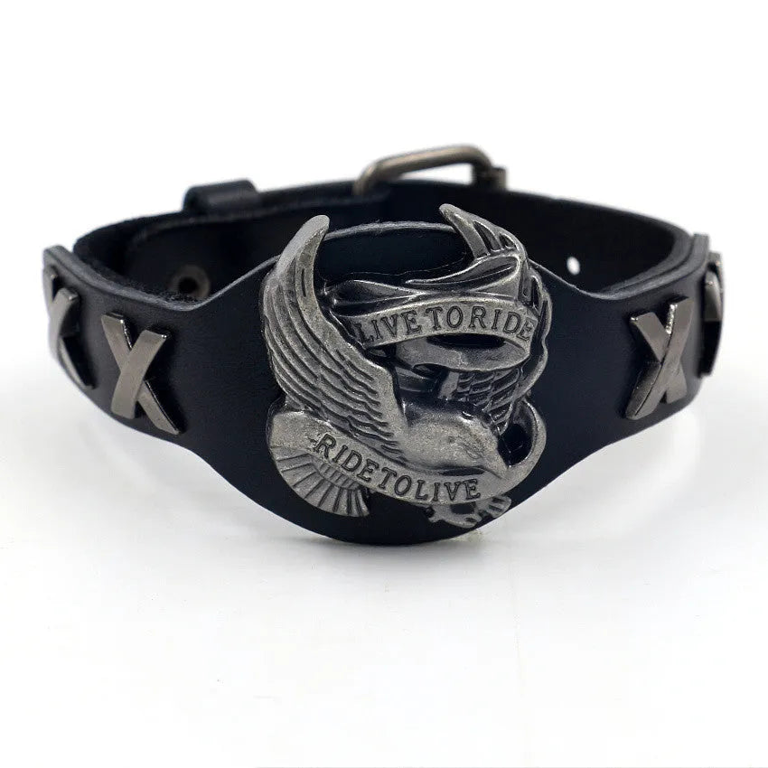 Black geometric leather bracelet with metallic eagle clasp showing 26cm length and varying width dimensions
