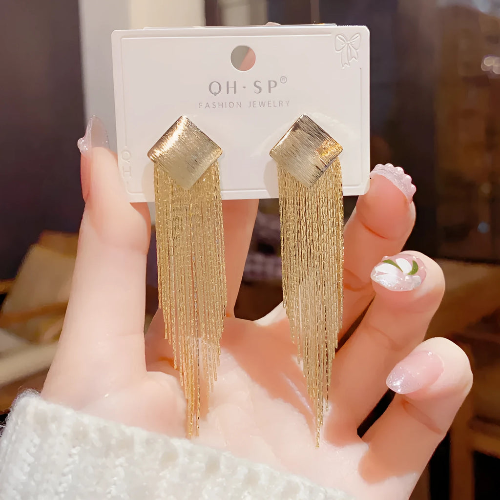 Pair of geometric tassel earrings with electroplated copper finish and real gold colour retention, simple style for women