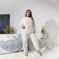 Women's milky white plush polyester two-piece lounge set with crew neck top and matching trousers