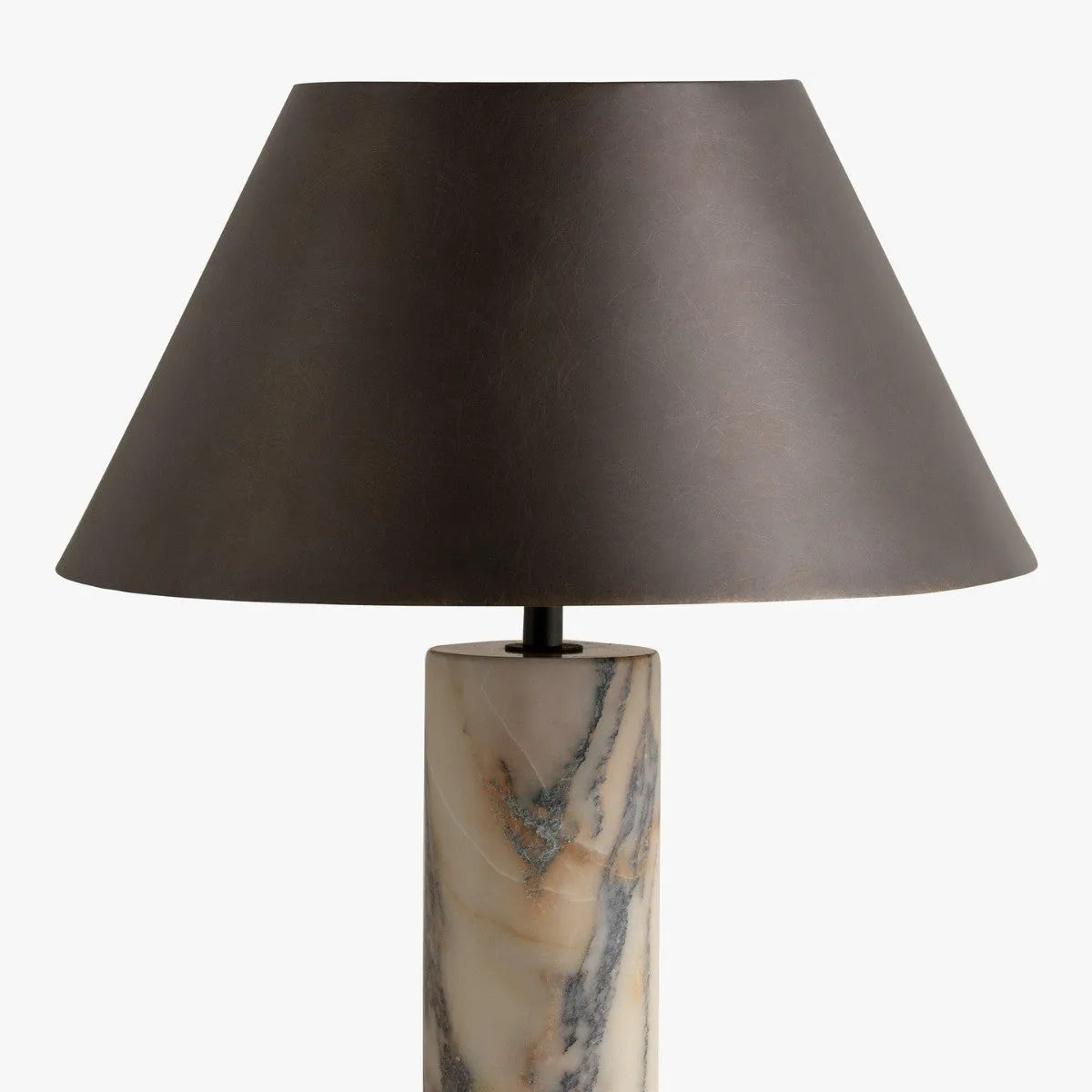 Black modern marble table lamp with minimalist design on wooden surface
