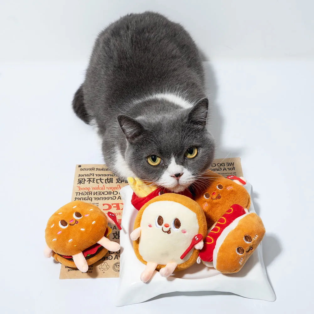 Five soft chew toys for kittens shaped like hamburger, chicken leg, fries, bread, and hot dog