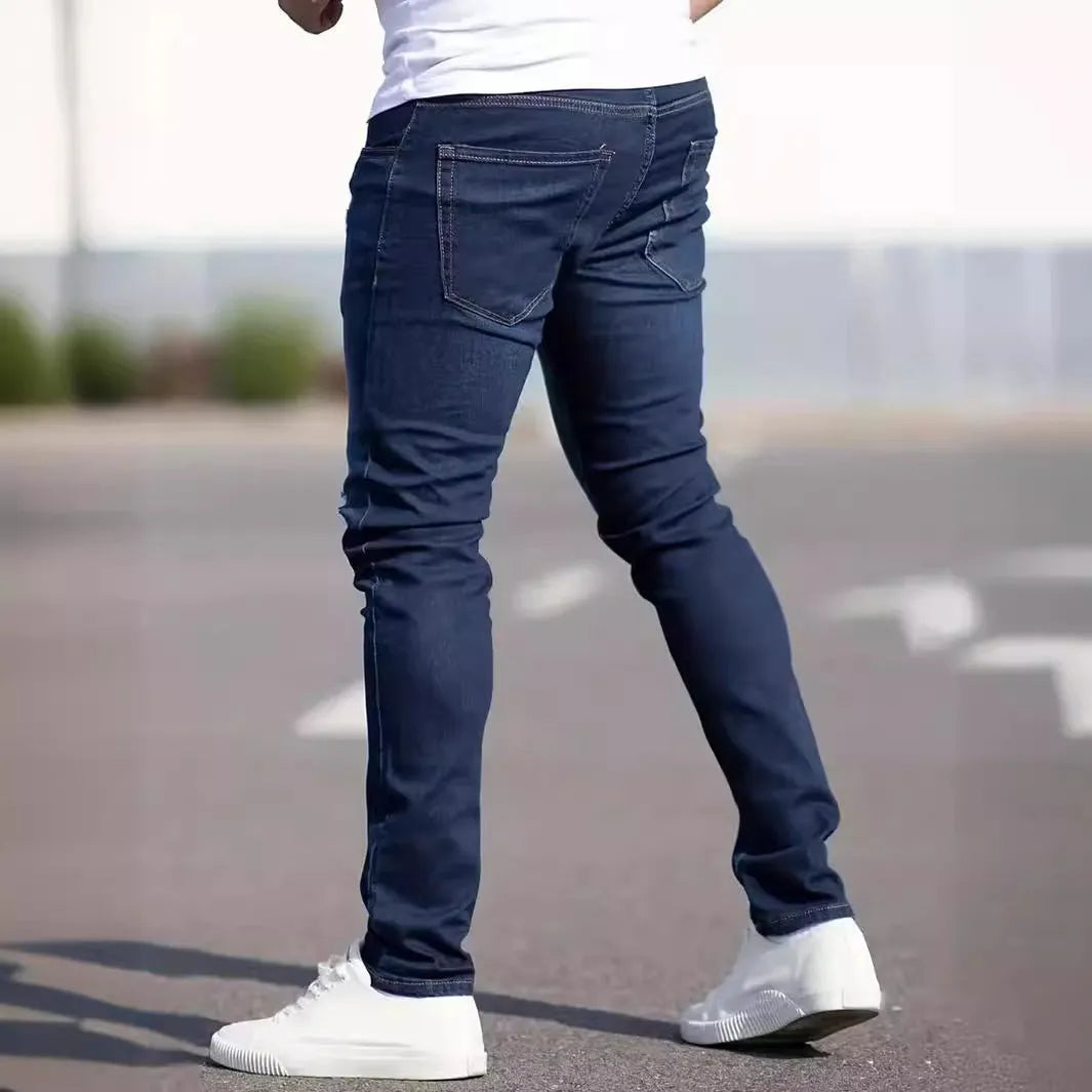 Dark blue men's slim fit casual jeans with medium elastic cotton construction
