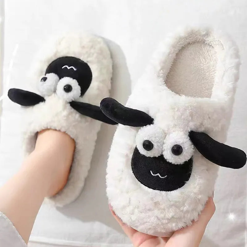 Simple lamb design thermal cotton suede slip-on slippers with a sewn PVC sole.