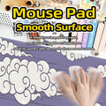 Large cloud pattern mouse pad with non-slip rubber base on a desk