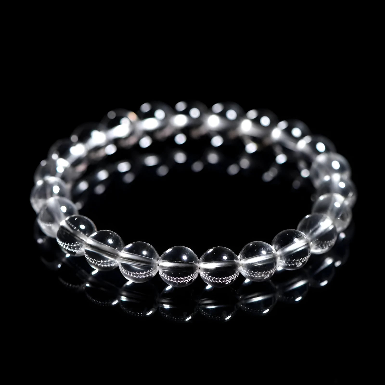 Natural Donghai old materials crystal bracelet with white water round beads in a geometric unisex design.