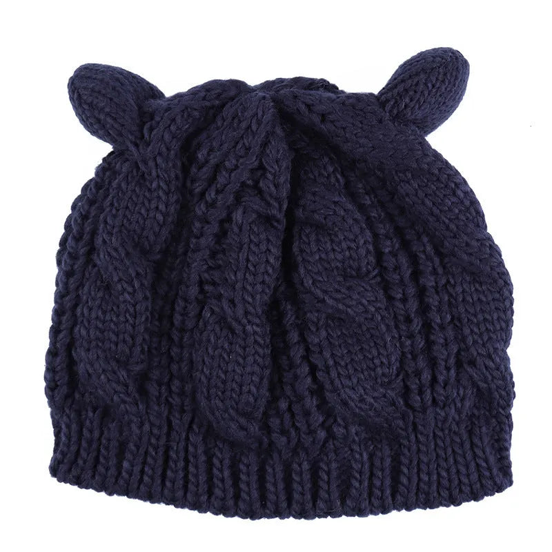 Hand made 3D knitted cat ear winter beanie in wool, shown in multiple colour options