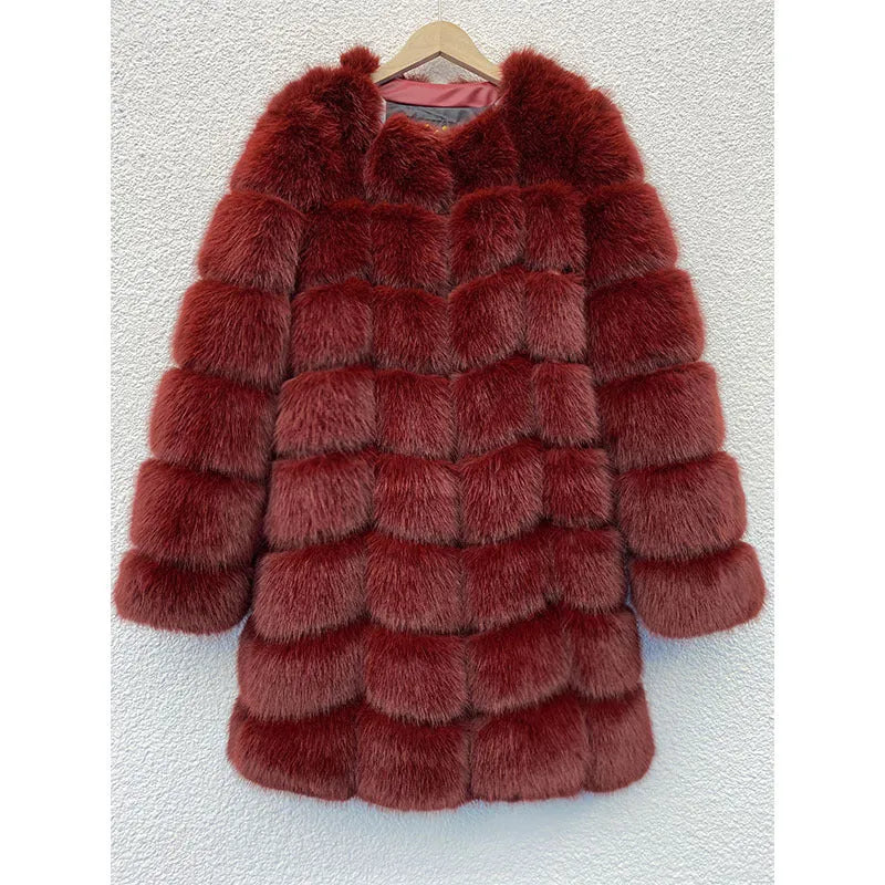 Women's thick black artificial fur coat with regular sleeves on a model.
