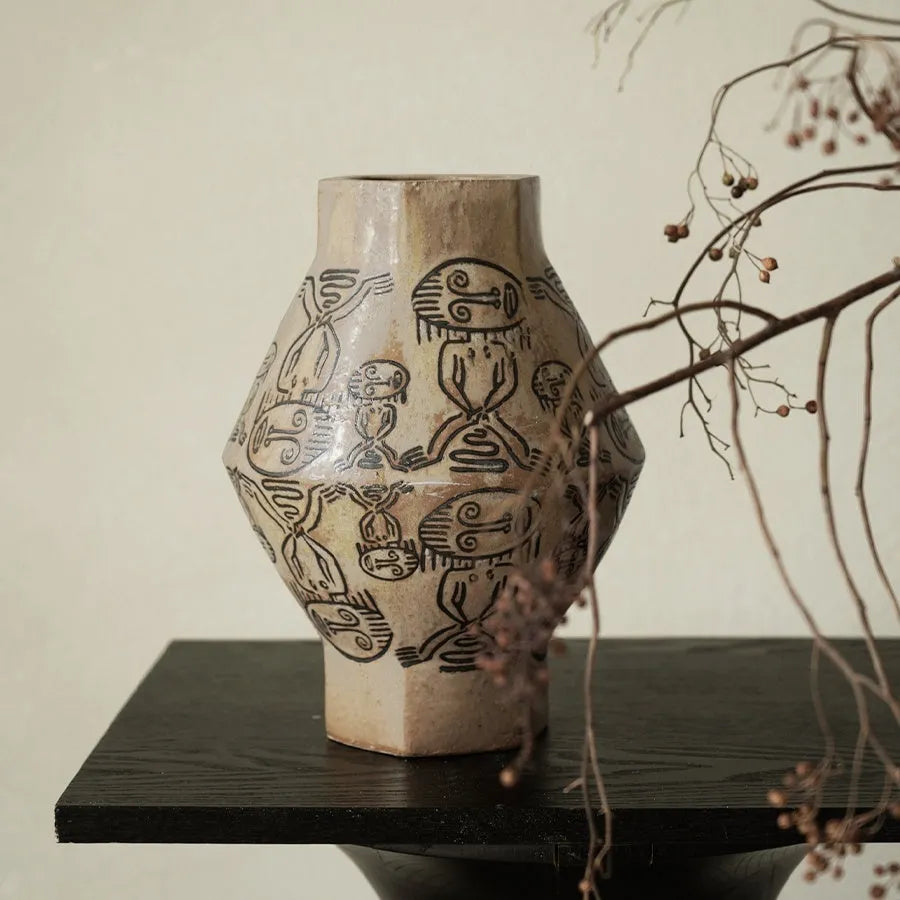 Hand-painted ceramic cylindrical vase with tribal totem floral patterns