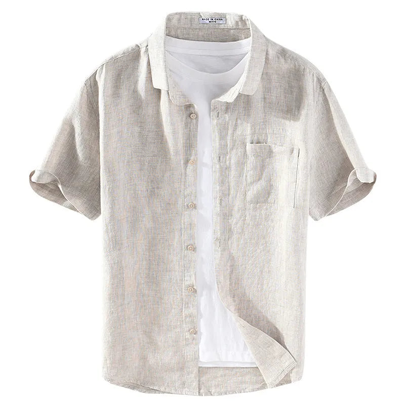 Men's raw jute coloured linen shirt with a square collar and short sleeves on a hanger.