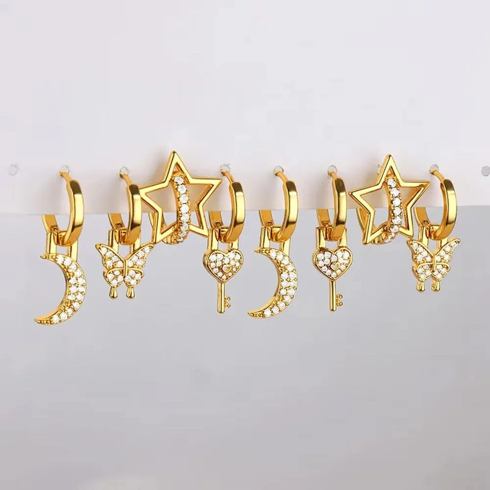 Women's copper butterfly earrings with irregular geometric heart and star designs in multiple colours