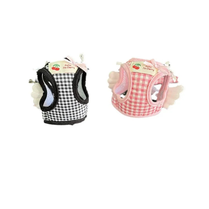 Small dog wearing pink cotton chest and back harness with adjustable straps