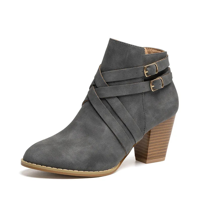 Women's plus size black short ankle boots with 7cm chunky heel and side zipper.