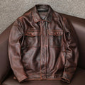 Men's black plus size lapel short leather jacket with side seam pockets, shown in a loose casual fit.