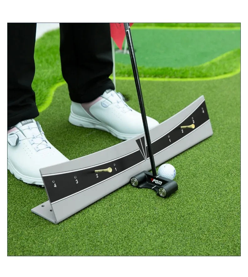 Adjustable golf putter trajectory balance simulator with PVC construction on a flat indoor surface.