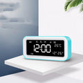 Multifunctional LED atmosphere light alarm clock with digital display and multicoloured lighting in rectangular plastic case
