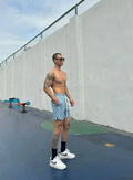 Men's ice silk quick-drying double-layer shorts in six colours with quarter-length design