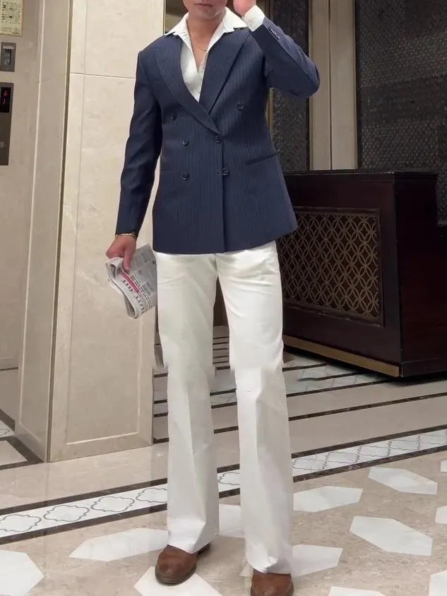 Men's classic striped double-breasted blazer on a hanger, regular fit.