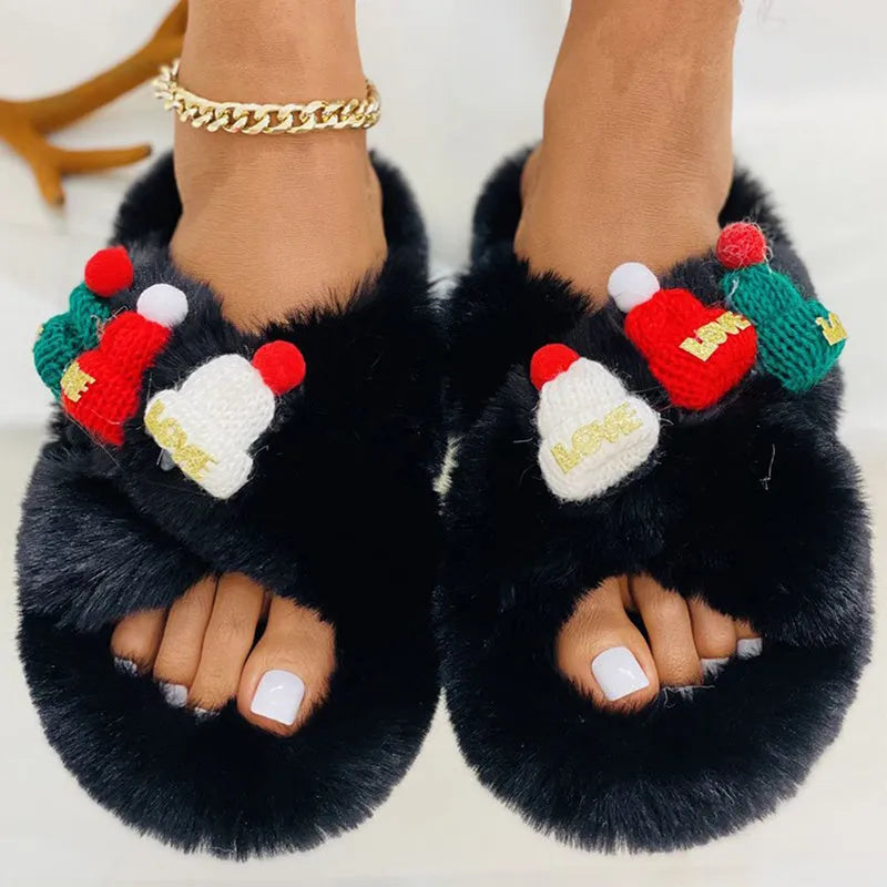 Women's Christmas hat design slippers with hairy plush cuff, cotton lining, and rubber sole.
