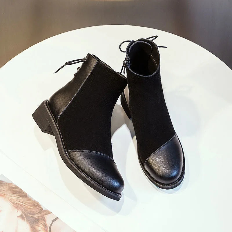 Women's black knee-high Martin boots with side zipper and round toe