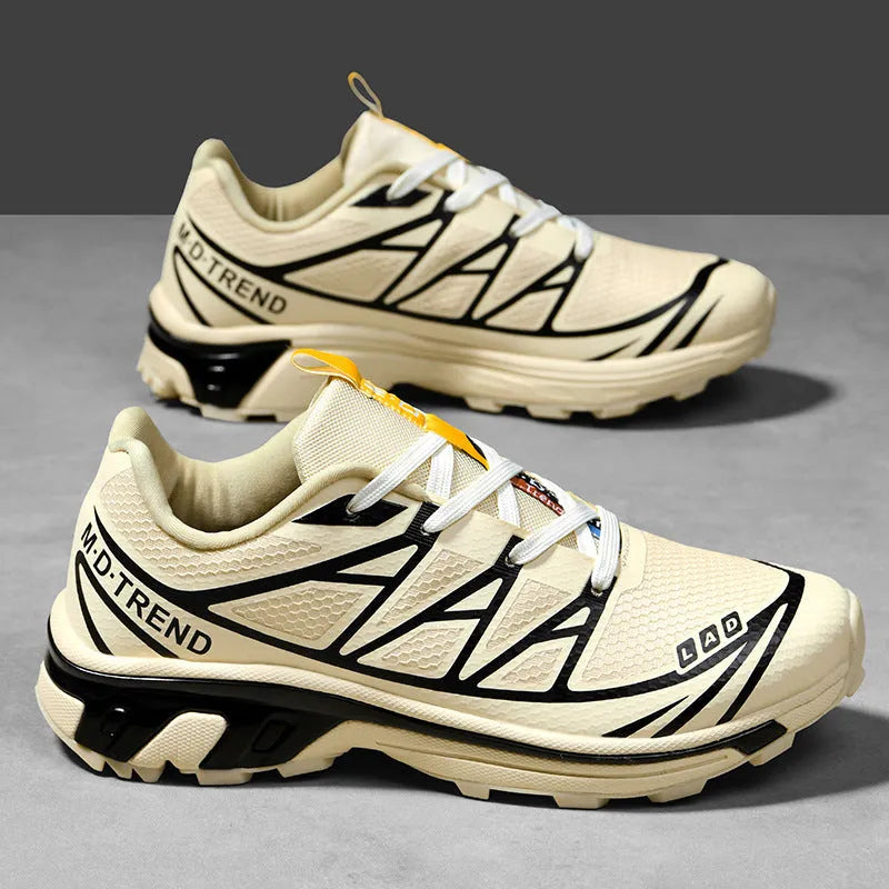 Low-top hiking shoes in artificial leather with mesh lining and a flat rubber sole.