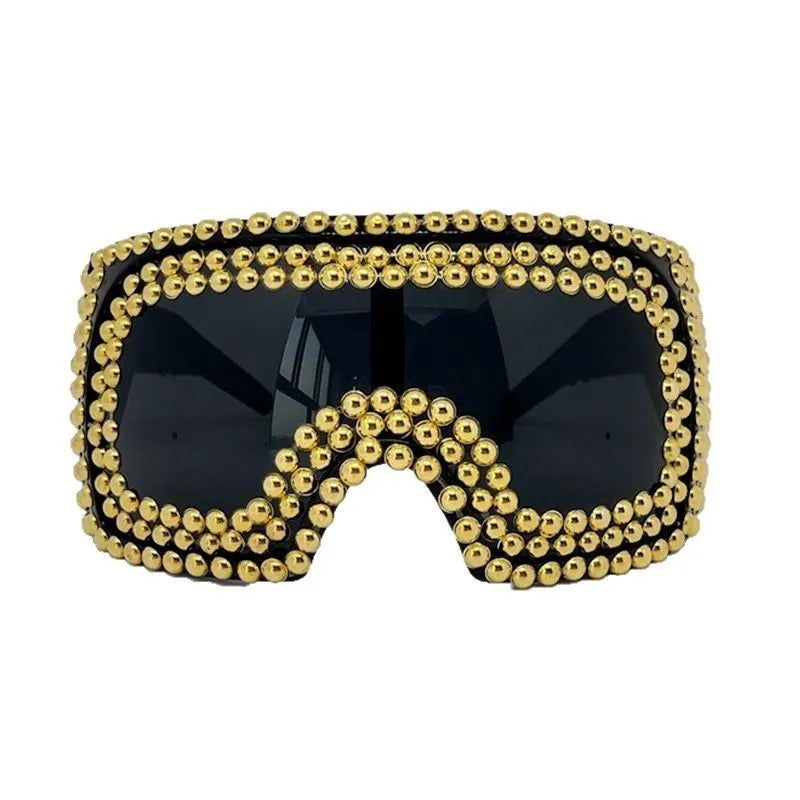 Men's punk sunglasses with large square frame and rivet detailing in silver colour
